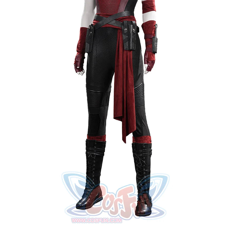 Elektra cosplay costume gathers black textured pants with a red fabric sash and faux leather holsters over tall boots.