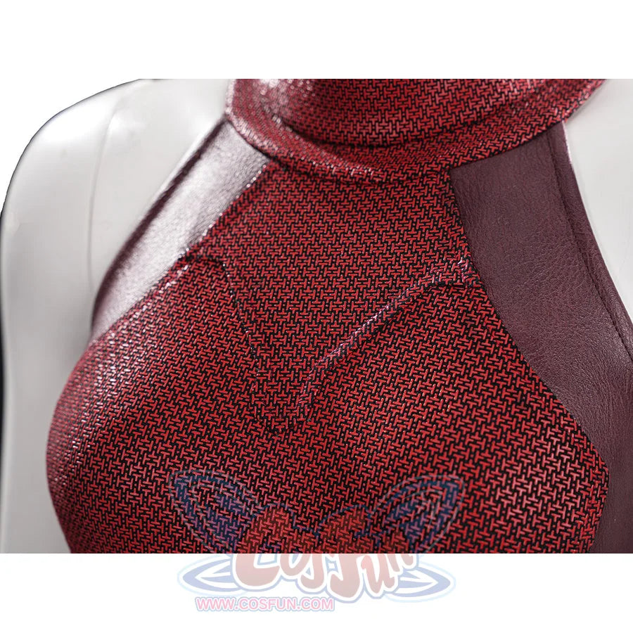 Elektra cosplay costume traces the intricate geometric patterns of the red printed stretch fabric bodice and faux leather.