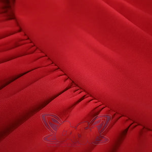 Elektra Natchios cosplay costume red stretch fabric gathers along a seam to create soft vertical folds in the material.