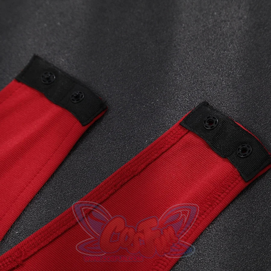Elektra Natchios cosplay costume straps trace red textured fabric and anchor black circular snaps for secure attachments.