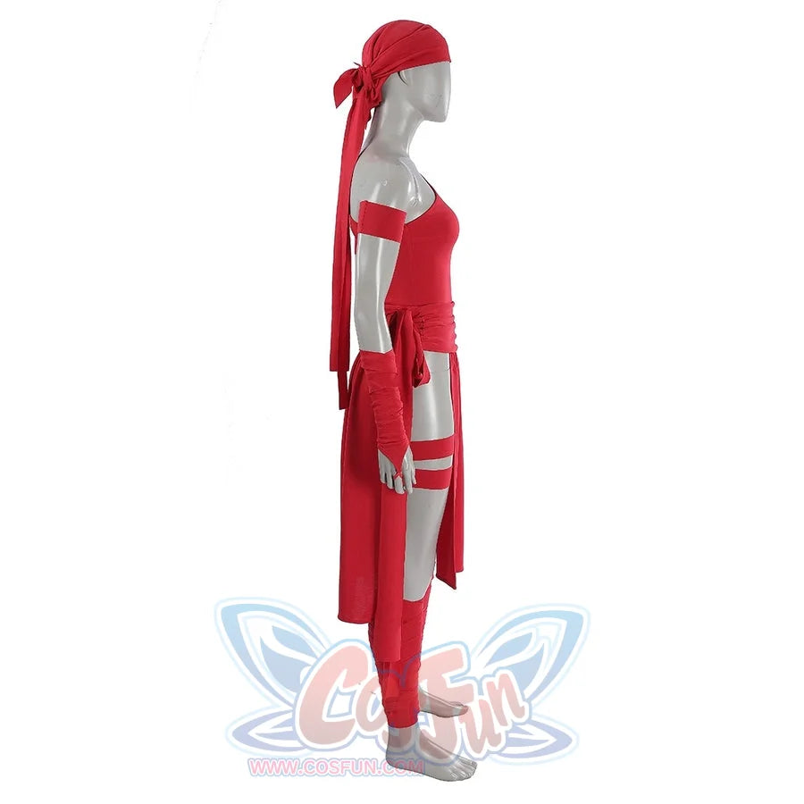 Elektra Natchios cosplay costume gathers red fabric in a side profile view that anchors the wrap and long head scarf ties.
