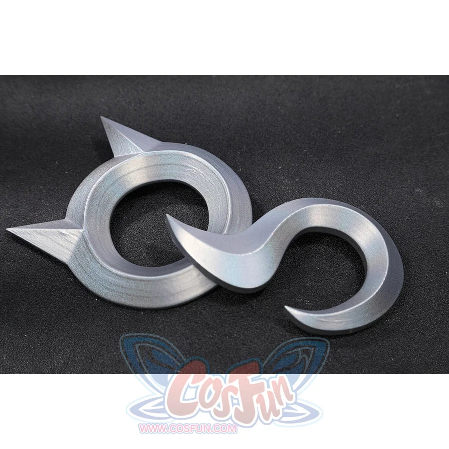 Felicia Hardy Urban Predator cosplay costume lays silver crescent belt plates as accessory pieces.