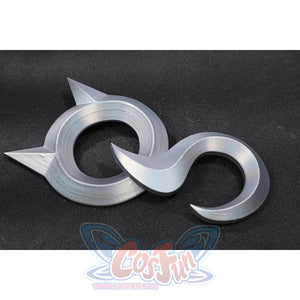 Felicia Hardy Urban Predator cosplay costume lays silver crescent belt plates as accessory pieces.