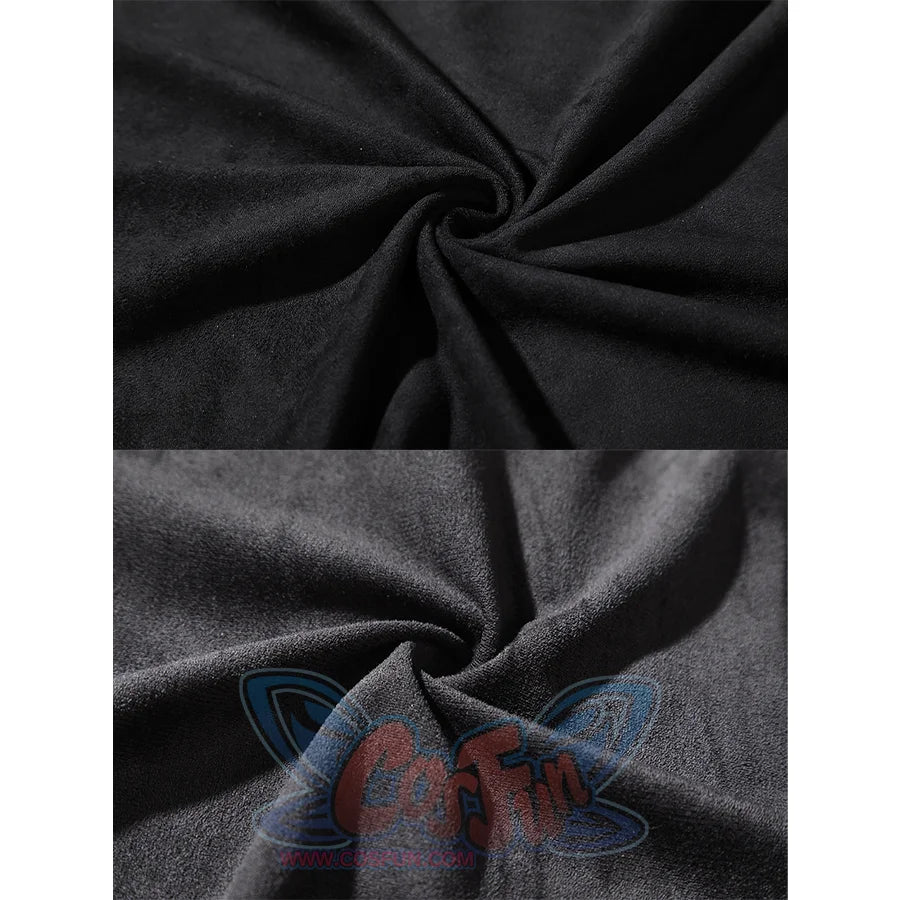 Close-up of black suede-like fabric arranged in folds to show the soft texture and drape of the material.