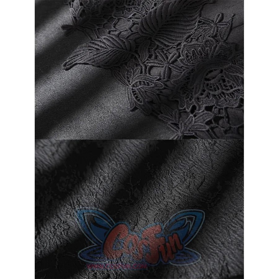 Close-up of black suede-like costume fabric with raised floral lace applique and textured material detail.