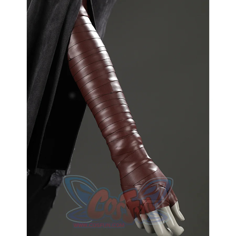 Close-up of the Dark Souls III Fire Keeper cosplay brown forearm glove wrap with layered banded detailing.