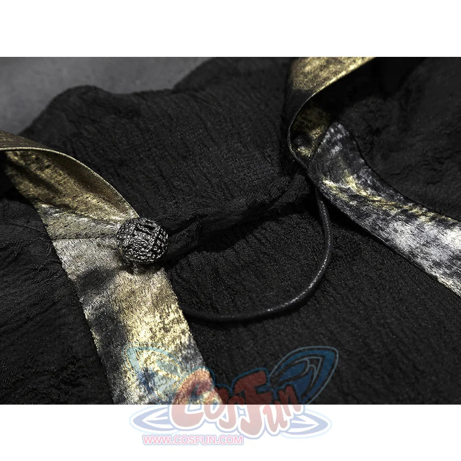 Close-up of the black cape clasp and cord on the Fire Keeper cosplay, highlighting textured fabric and metallic trim.