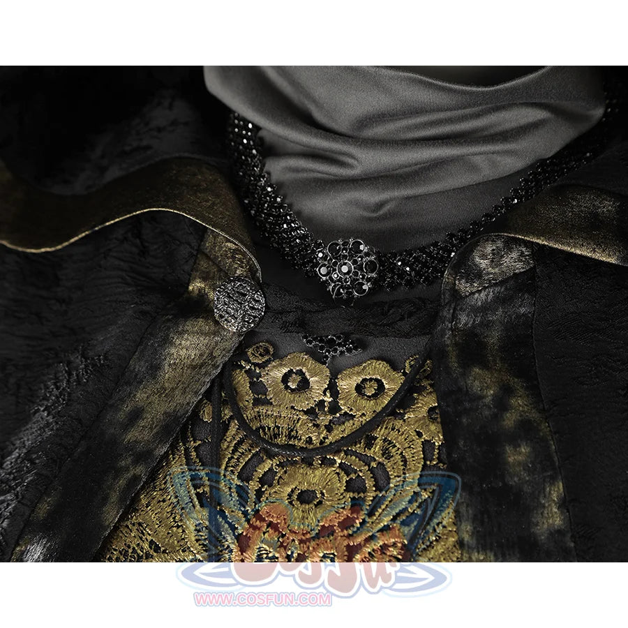 Close-up of the Fire Keeper cosplay collar and neckline with black beaded trim, clasp detail, and gold embroidery.