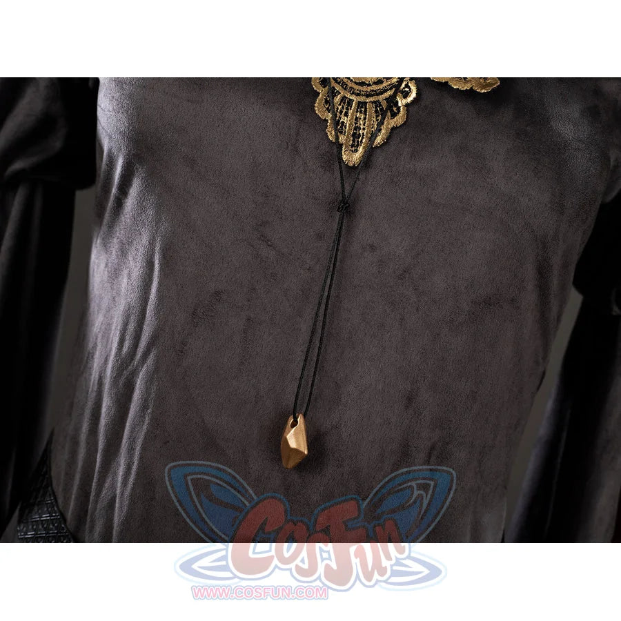 Dark Souls III Fire Keeper cosplay costume pendant detail rests over the gray jacquard tunic