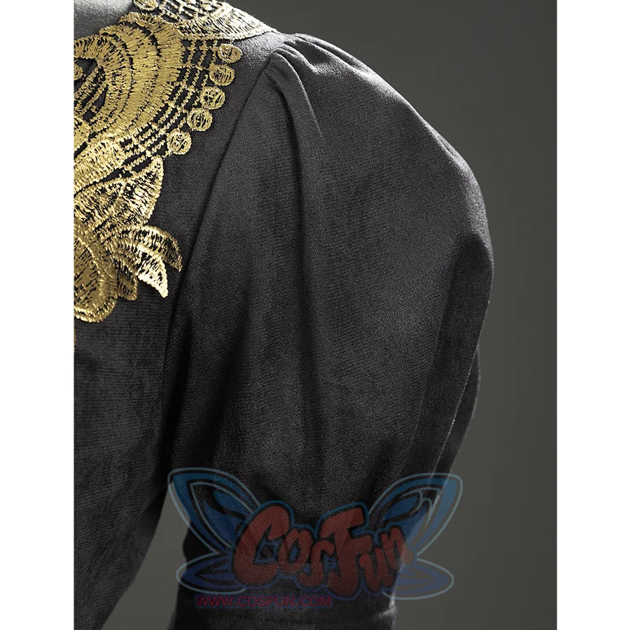 Close-up of the Fire Keeper cosplay puff sleeve in dark suede fabric with part of the gold neckline trim.