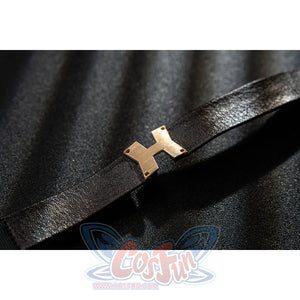 Genshin Impact Bennett cosplay black strap detail anchors a gold-tone cross buckle over glossy trim