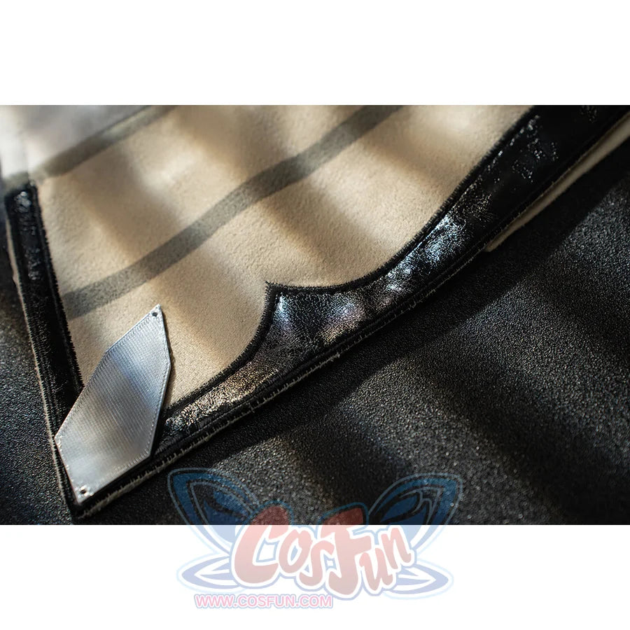 Genshin Impact Bennett cosplay trim detail frames cream fabric with glossy black edging and a silver-tone corner
