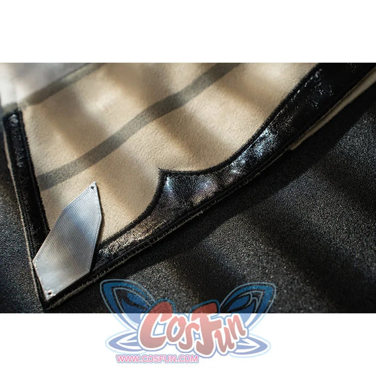 Genshin Impact Bennett cosplay trim detail frames cream fabric with glossy black edging and a silver-tone corner