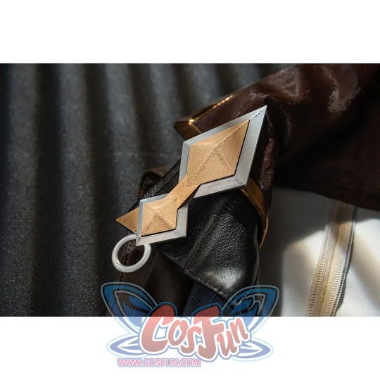 Genshin Impact Bennett cosplay chest ornament detail anchors a gold-tone diamond accent over black and brown trim
