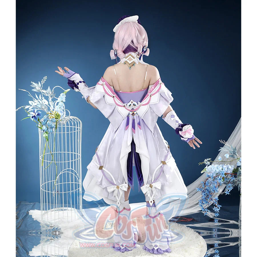 Genshin Impact Citlali cosplay costume back view frames a layered white dress and gold details.