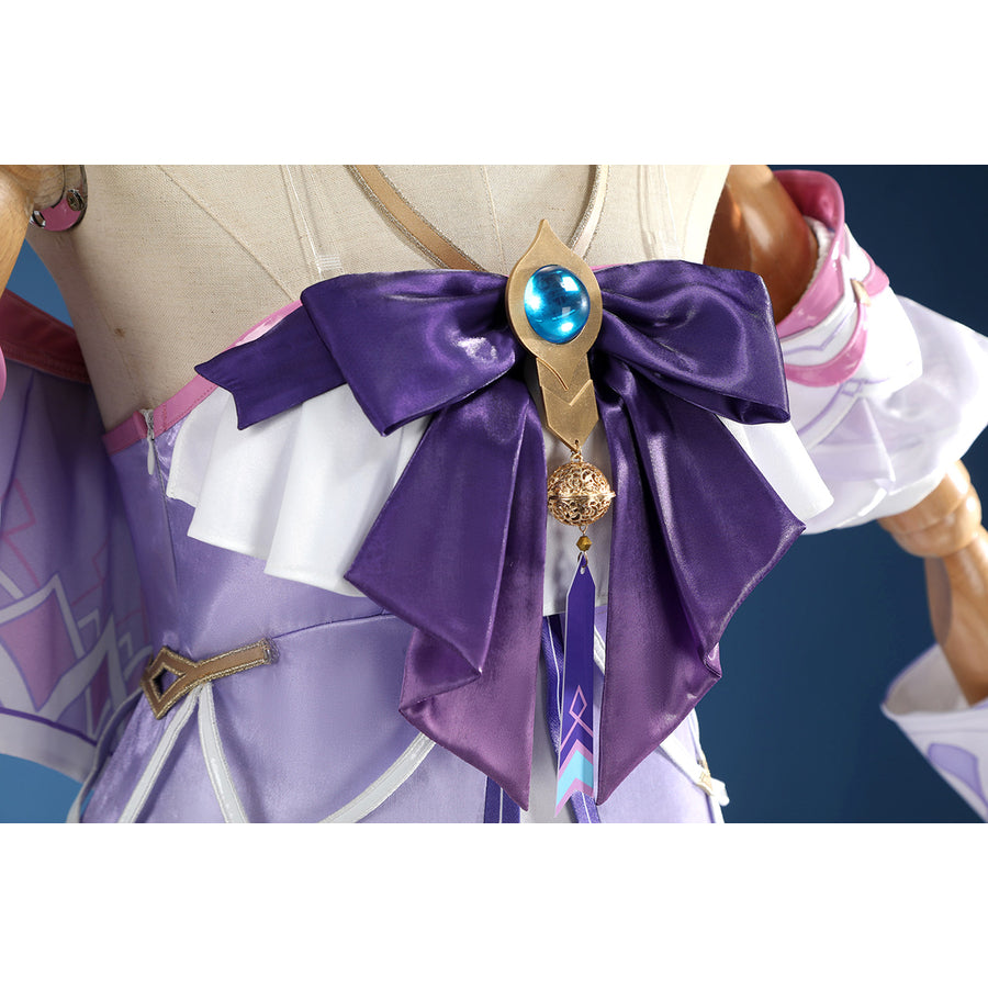 Genshin Impact Citlali cosplay chest bow detail centers a blue gem and gold-tone charm.