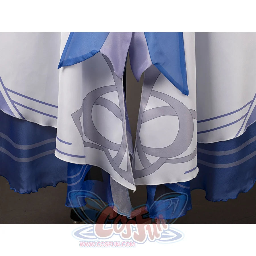 Genshin Impact Columbina cosplay layered skirt frames gray crescent patterns above deep blue sheer hems.