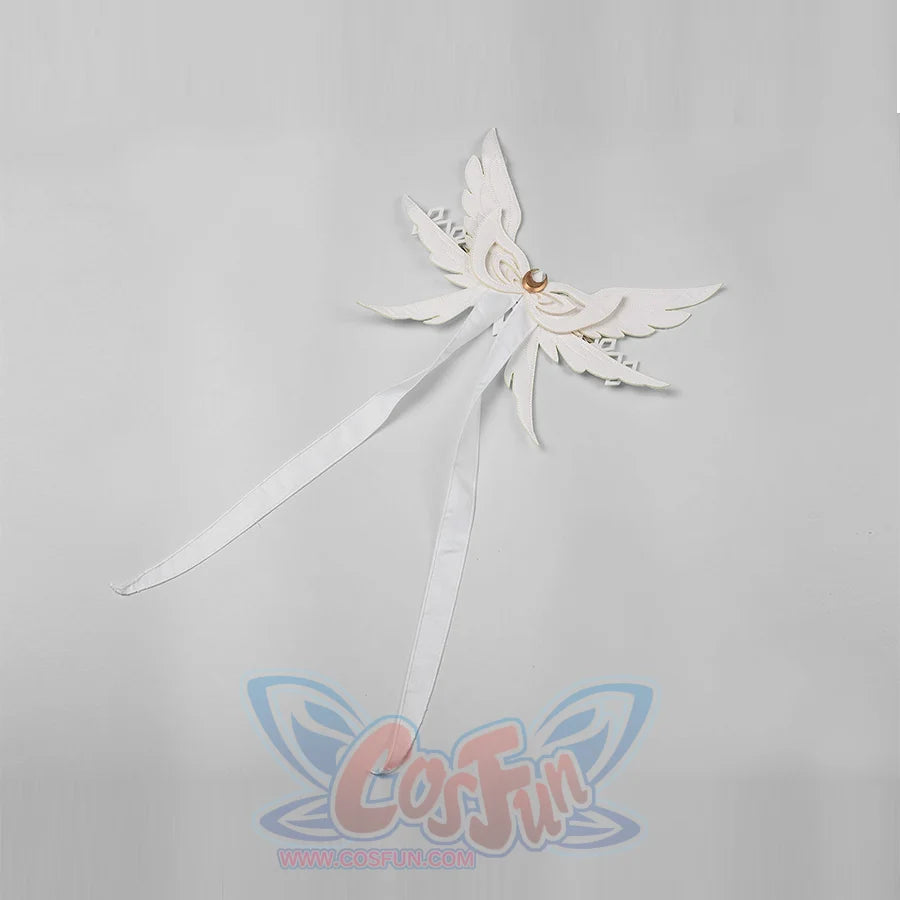 Genshin Impact Columbina cosplay headwear spreads winged white shapes around gold-tone crescent details.