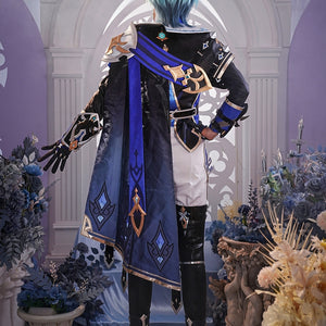Genshin Impact Lohen cosplay costume layers a long blue cape over structured black jacket panels and intricate arm guards.