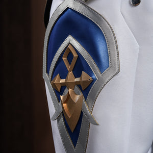 Genshin Impact Lohen cosplay costume knee guard detail layers a blue geometric panel beneath a rigid gold-tone cross emblem.