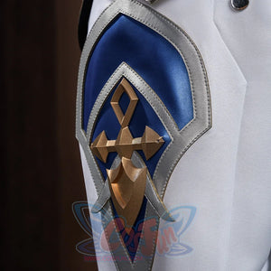 Genshin Impact Lohen cosplay costume knee guard detail layers a blue geometric panel beneath a rigid gold-tone cross emblem.