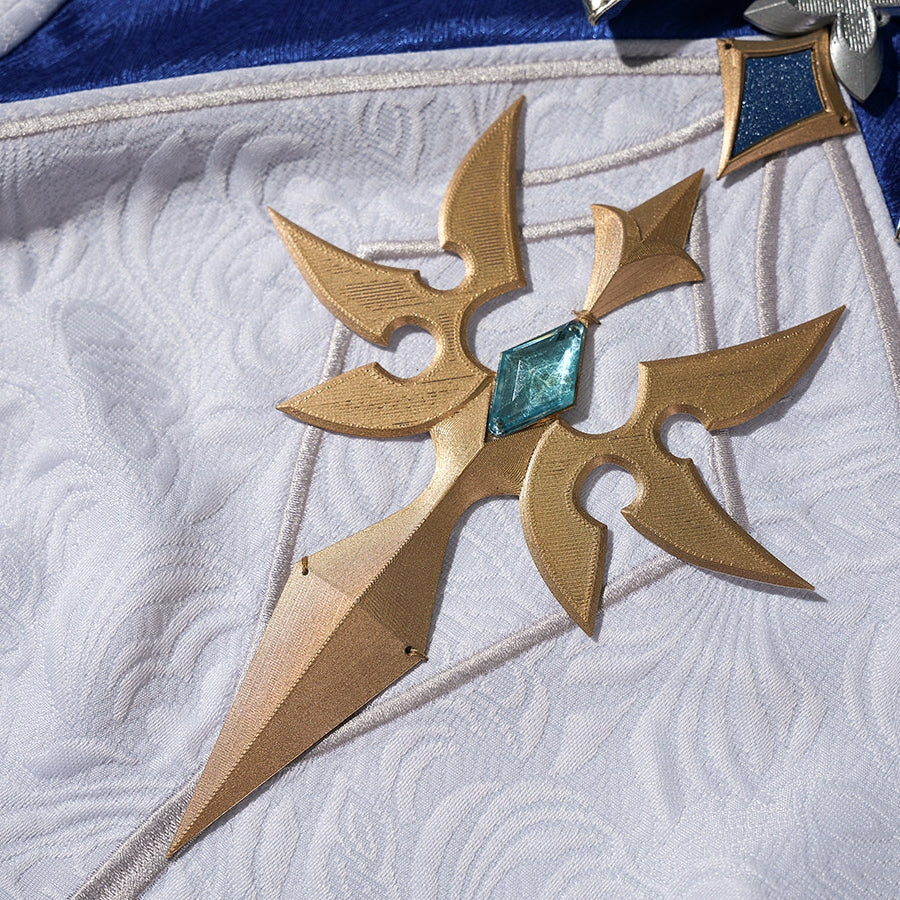 Genshin Impact Lohen cosplay costume accessory sits atop textured white jacquard fabric anchored by a blue gem-like center.