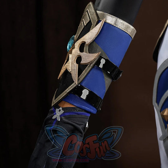 Genshin Impact Lohen cosplay costume wrist guard armor piece gathers blue fabric under gold-tone wing accents.