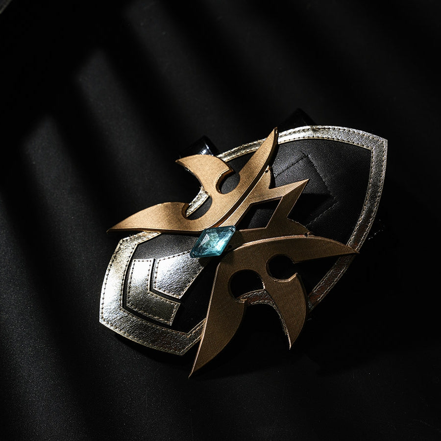 Genshin Impact Lohen cosplay costume wrist guard piece traces gold-tone layers around a central blue gem-like accent detail.