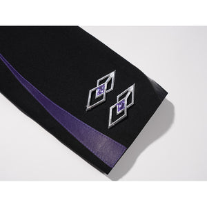 Genshin Impact Pantalone cosplay costume sleeve cuff lays purple trim beside diamond-shaped emblems.