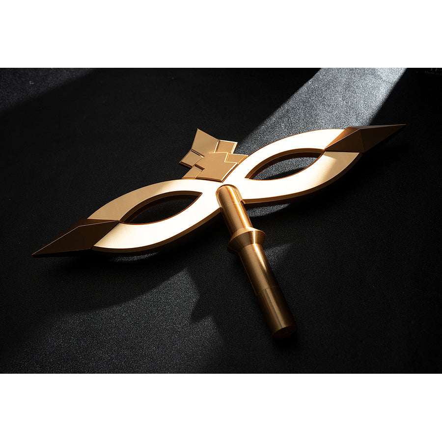 Genshin Impact Sandrone cosplay clockwork spring prop key handle balances a gold-tone bow shape and pointed tips