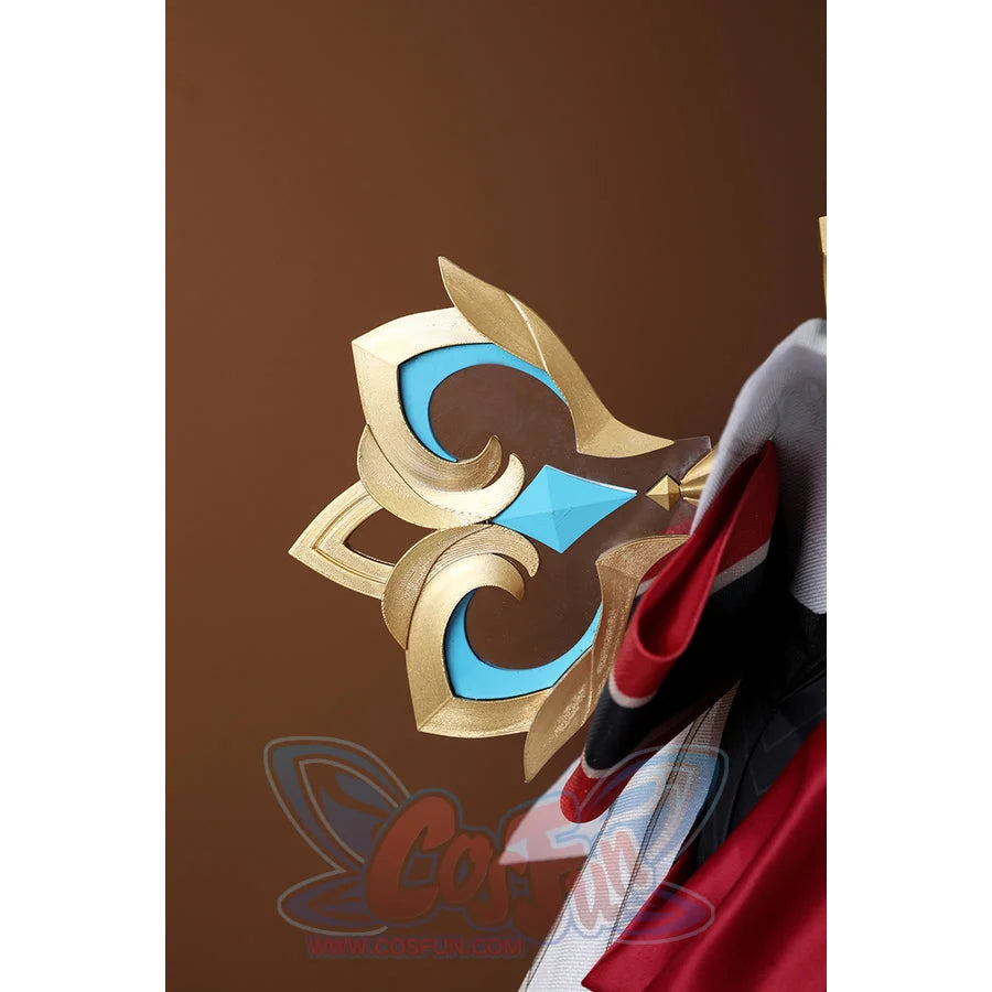 Genshin Impact Sandrone cosplay costume detail anchors a gold-tone emblem beside blue inlays and fabric bows.