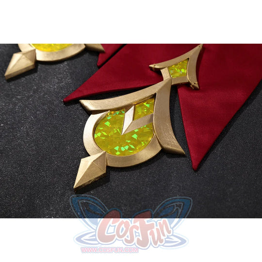 Genshin Impact Sandrone cosplay costume has a gold geometric ornament with yellow facets against red satin.