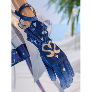 Genshin Impact Snezhnaya Odette cosplay glove close-up layers blue fabric under a gold-tone heart trim.