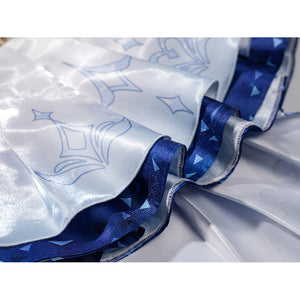 Genshin Impact Snezhnaya Odette cosplay skirt hem detail layers white printed satin over dark blue trim.