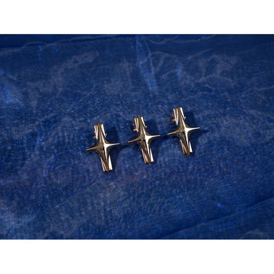 Genshin Impact Snezhnaya Odette cosplay star pins flat lay groups small gold-tone accents for the costume.