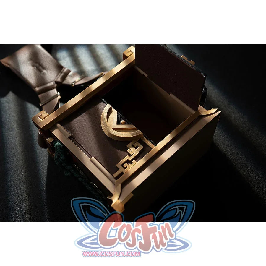 Genshin Impact Yanfei cosplay waist accessory inner view angles the gold-tone frame around dark inserts.