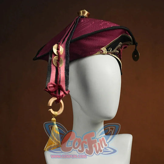 Genshin Impact Yanfei cosplay hat side view frames burgundy fabric with gold-tone trim and tassels.