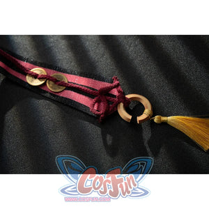 Genshin Impact Yanfei cosplay hat tassel detail ties burgundy cords to a gold-tone moon charm.