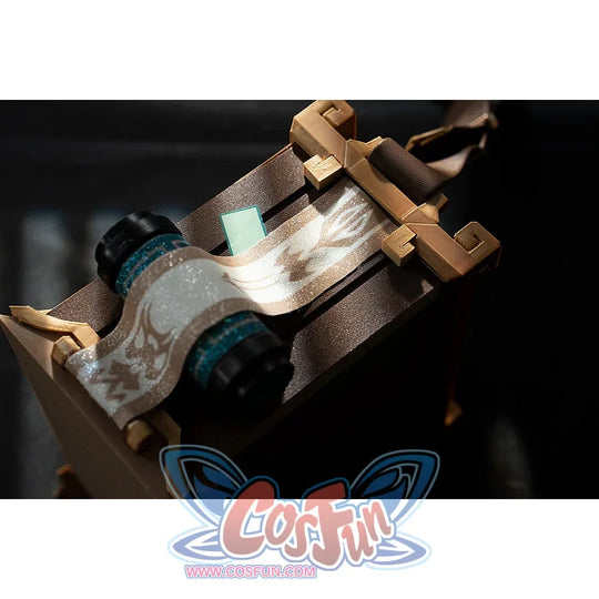 Genshin Impact Yanfei cosplay waist accessory close-up frames a pale scroll motif in gold-tone trim.