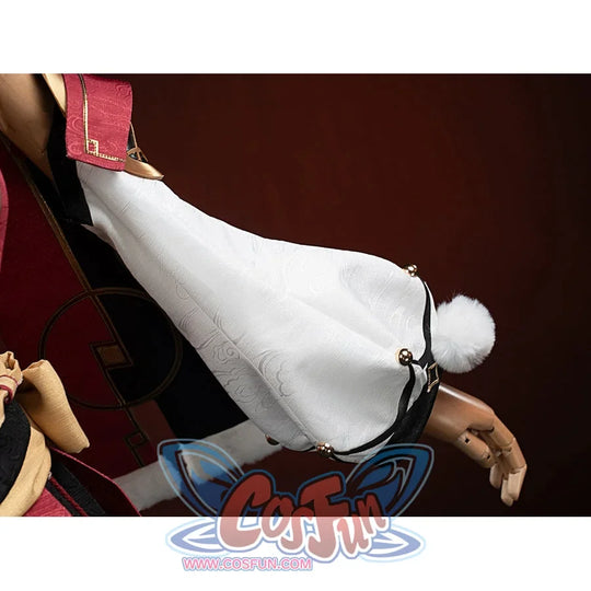 Genshin Impact Yanfei cosplay sleeve cover detail gathers ivory fabric at a pom-pom cuff.