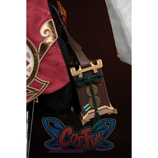 Genshin Impact Yanfei cosplay waist accessory hangs a gold-tone charm over black and teal accents.