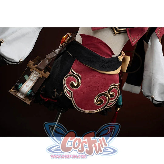 Genshin Impact Yanfei cosplay waist panel detail layers red embroidery above black shorts and side accessories.