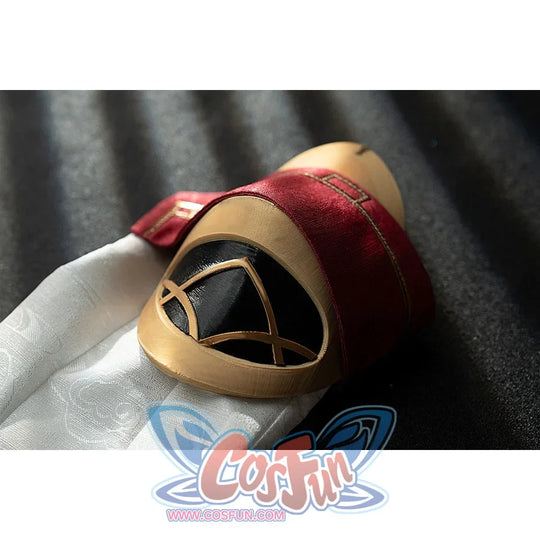 Genshin Impact Yanfei cosplay wrist cuff detail curves gold-tone trim around burgundy fabric.