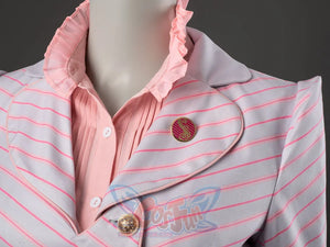 Glinda cosplay blazer close-up with a striped lapel set over a ruffled pink blouse and round brooch