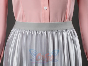 Glinda cosplay skirt close-up showing a gray waistband gathered over crisp silver pleated fabric