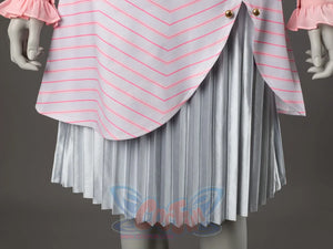 Glinda cosplay skirt close-up showing a curved pink-striped wrap panel over silver pleated layers