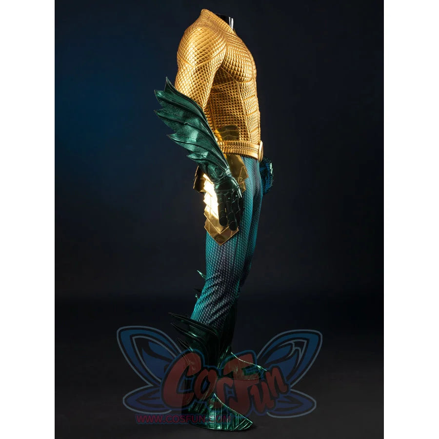 Gold-tone armored cosplay costume side view layers teal scales below a raised chest and hip guard.