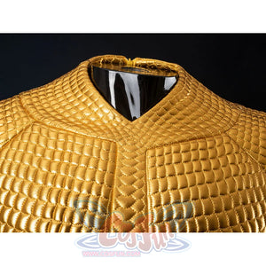 Gold-tone armored cosplay neckline detail frames a V-shaped collar across raised quilted texture.