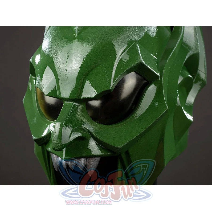 Green Goblin Norman Osborn cosplay helmet eye close-up sets black lenses inside angular green armor.