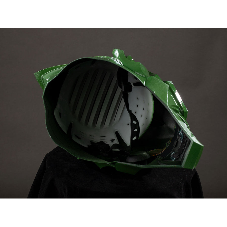 Green Goblin Norman Osborn cosplay helmet rear view reveals black inner padding beneath green shell plates.